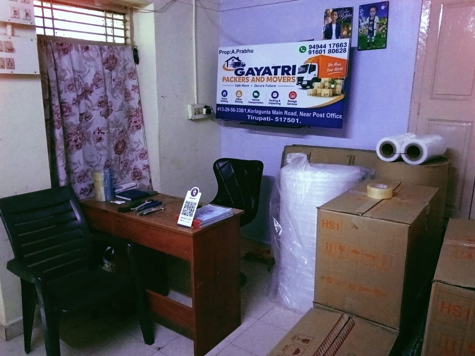 Gayatri Packers and Movers office and service signboard in Tirupati